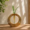 Hand-carved solid mango wood circular hydroponic planter with borosilicate glass test tubes and indoor plants for home and office décor.