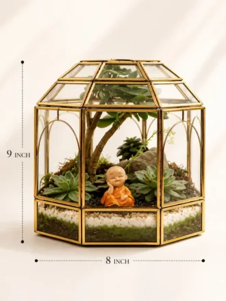 Geometric dome glass house terrarium with Buddha figurine and succulent plants by Wildroots Gifting for desktop décor and gifting across India via gifting.wildroots.in.