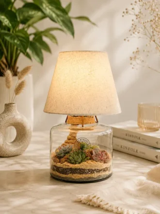 Glass lamp terrarium with succulent plants and fabric lampshade decorative indoor table lamp for modern home décor.