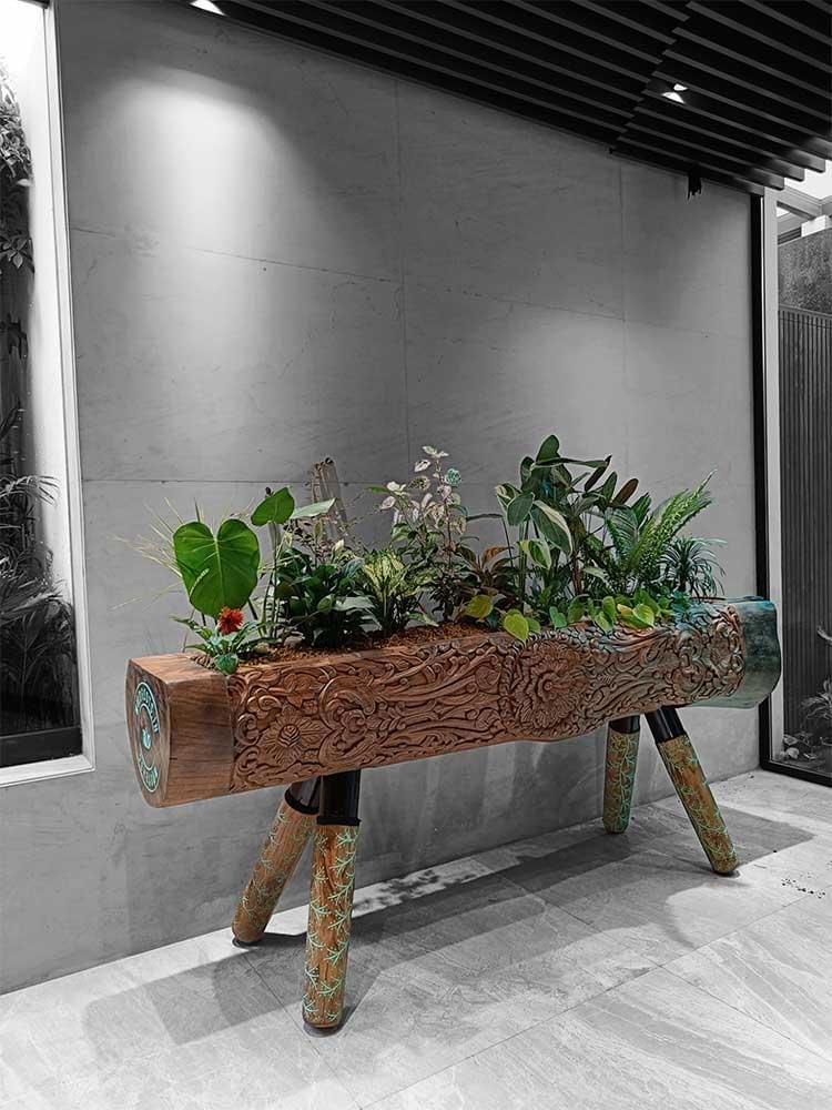 "Discover the rustic charm of Hand Carved Sal Wood Wooden Log Planters. Transform your space with nature's elegance today!"
